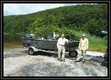 AL and Pete next to the Lund at the ramp. This super 16.75' boat sports a 50HP 2 stroke ETec, and 9.9 Honda 4 Cycle kicker. For this lake though we could only use the Motorguide 43LB electric.