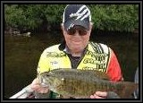 AL is all smiles hooking up this decent size Smallmouth on the Warrior Buzzbait