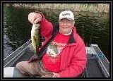 Bob hooks up a decent size Largemouth Bass on the southern end of the lake.