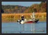 AL & Vinny fishing down river for Largemouth Bass & Pike using a Tube Bait.