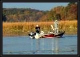 AL & Vinny fishing down river for Largemouth Bass & Pike using a Tube Bait.