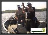 Dan checks out the weight of this 6 1/2 lb Largemouth Bass he caught with the 5" Tiki Snake.