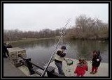 We arrive just in time to see some anglers... AL and his KIds pull in a really nice Largemouth Bass.